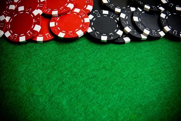 Player using mobile app to check Paito Harian charts during live tournament